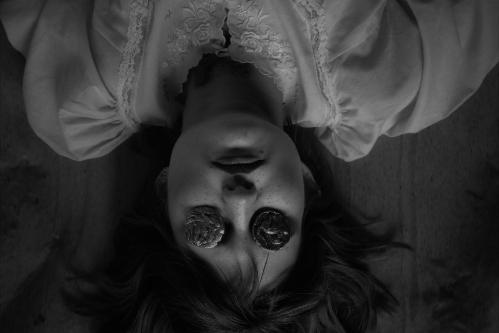 Overhead black and white portrait, hard toppy key